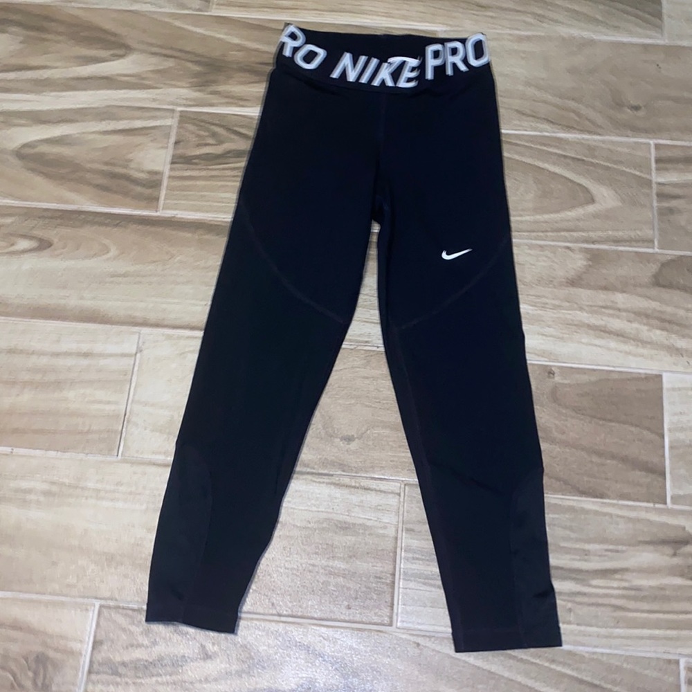 nike pro cropped leggings, mesh at bottom